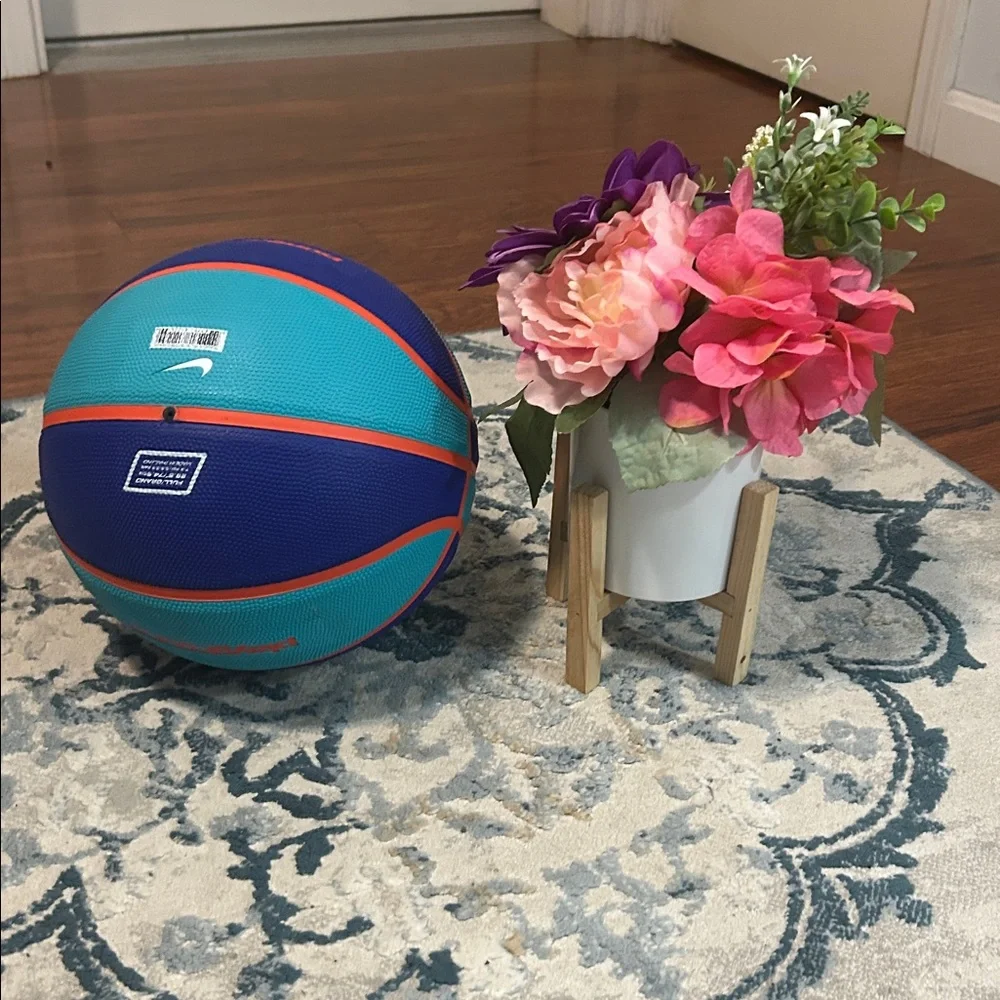 Purple Artificial Flower Arrangement in Modern Pot
